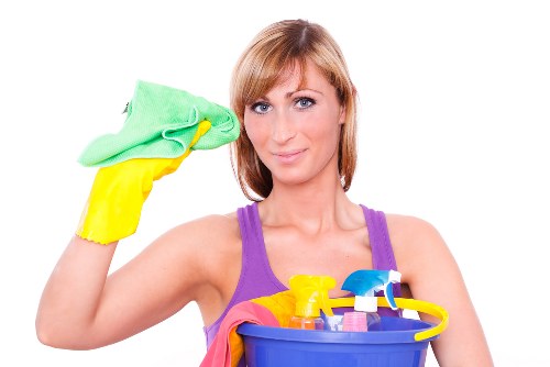 Cleaner preparing equipment before starting a safe cleaning task