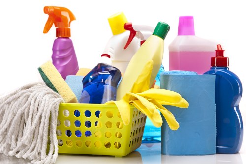 Professional cleaner working in a local Outhkensington office building